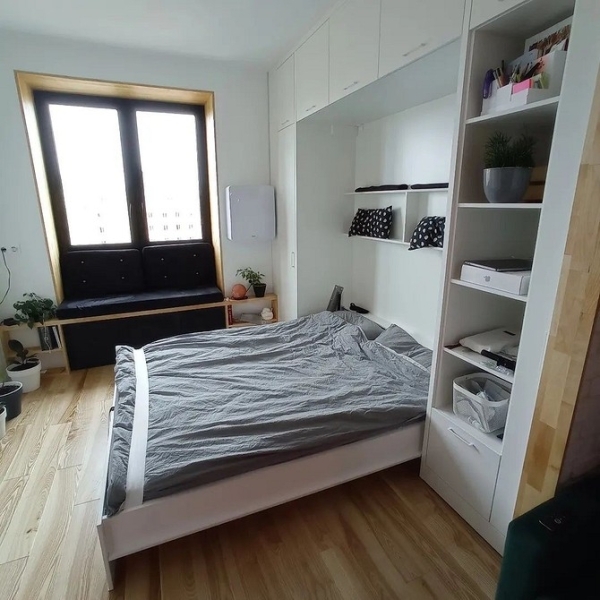 Кровать в однокомнатной квартире: варианты размещения и примеры планировок (86 фото)